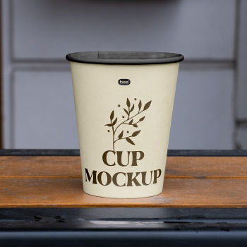 Free Paper Cup on Railing Mockup