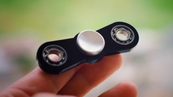 Free Photo of fidget spinner, hand, toy Free Photo of fidget spinner, hand, toy