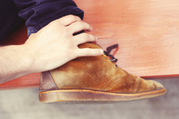 Free Photo of shoes, hands, jeans Free Photo of shoes, hands, jeans