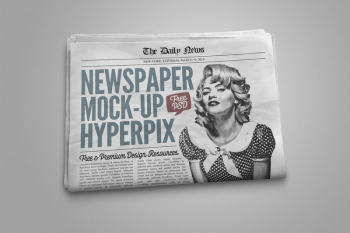 Free Photorealistic Newspaper Mockup