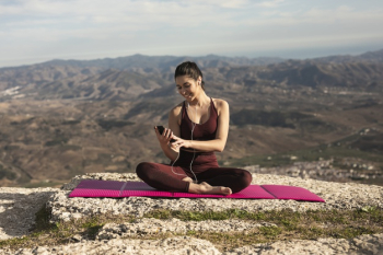 Front view woman doing yoga mock-up Free Photo