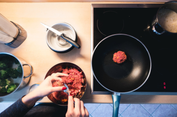 Frying ground beef burger meat Frying ground beef burger meat