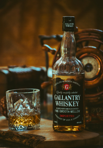 Gallantry Whiskey Bottle Beside Glass Gallantry Whiskey Bottle Beside Glass
