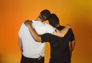 Gay Couple Embrace And Celebrate Pride Gay Couple Embrace And Celebrate Pride