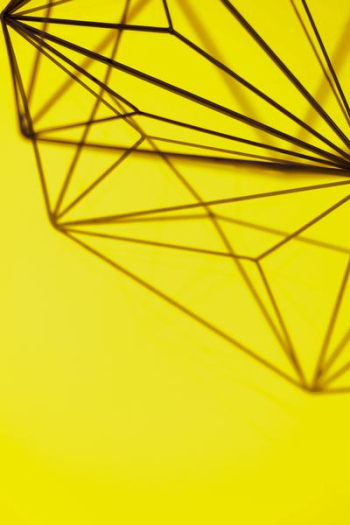 Geometric decoration on yellow background Geometric decoration on yellow background
