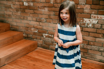 Girl In Dress Smiles Girl In Dress Smiles