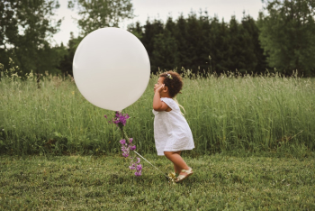 Girl Playing With Balloon Girl Playing With Balloon