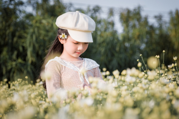Girl Standing on White-petaled Flower Field Girl Standing on White-petaled Flower Field