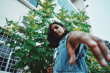 Girl Wearing Blue Denim Vest Girl Wearing Blue Denim Vest