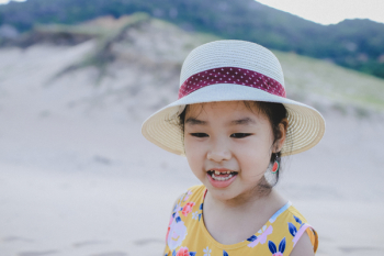 Girl Wearing White Hat Smiling Girl Wearing White Hat Smiling