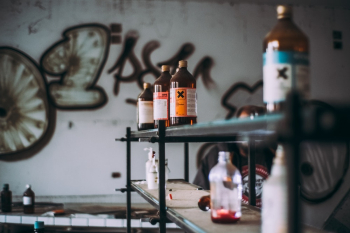 Glass Bottles on Shelf Glass Bottles on Shelf