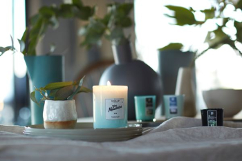glass candle holder on ceramic plate glass candle holder on ceramic plate