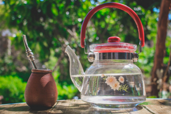 Glass Kettle Near Clay Container Glass Kettle Near Clay Container