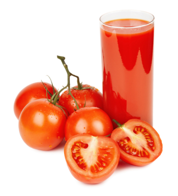 Glass of tomato juice and ripe tomatoes isolated on white