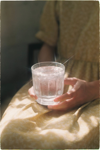 Glass of Water in Hands Glass of Water in Hands