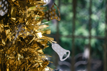 Gold Tinsel Decor With White Flower Ornament Gold Tinsel Decor With White Flower Ornament