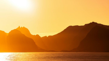 Golden Sunset Over Mountainous Landscape Golden Sunset Over Mountainous Landscape