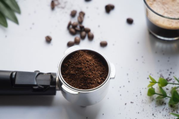 grained coffee in gray stainless steel container grained coffee in gray stainless steel container