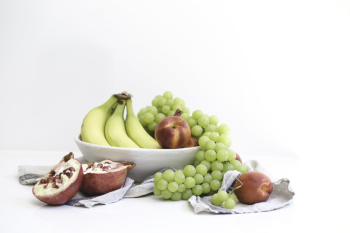 Grapes and Bananas in White Bowl Grapes and Bananas in White Bowl