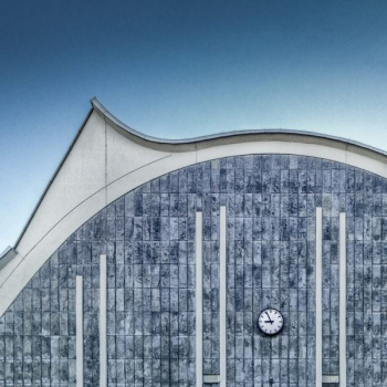 gray and white concrete wall with analog wall clock gray and white concrete wall with analog wall clock