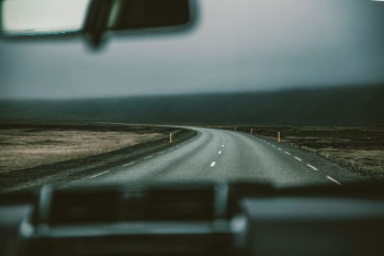 gray asphalt road under gray sky gray asphalt road under gray sky