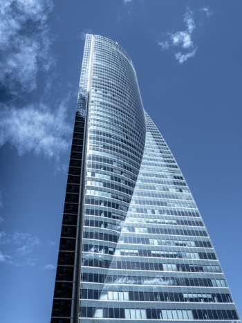 Gray Building Under Cloudy Sky Gray Building Under Cloudy Sky
