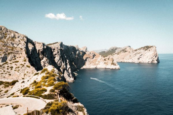 gray cliff beside sea