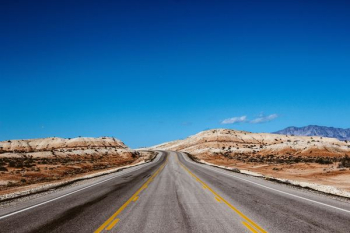 gray concrete road photograph gray concrete road photograph