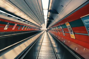 Gray Escalator Beside Posters Gray Escalator Beside Posters