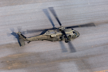 Gray Helicopter on Gray Road