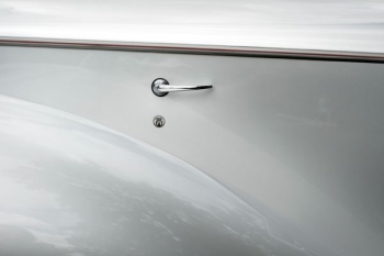 gray knob on gray wall