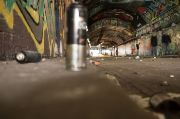 gray paint can near wall gray paint can near wall