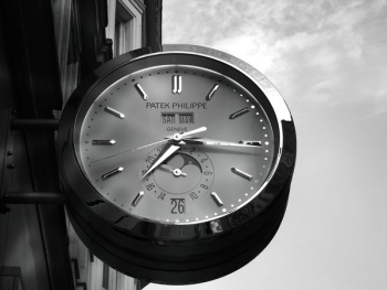 Gray Patek Philippe Clock Displaying 7:16