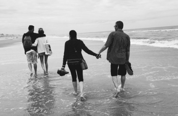 Gray Scale of Two Couples on the Beach Gray Scale of Two Couples on the Beach
