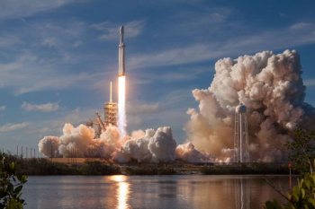 gray spacecraft taking off during daytime gray spacecraft taking off during daytime