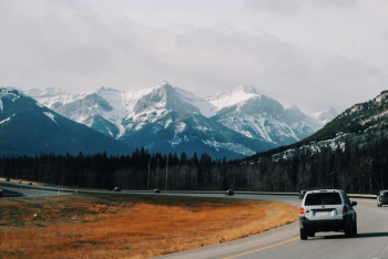 gray SUV on gray road