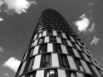 Grayscale of Building Under Sky Grayscale of Building Under Sky