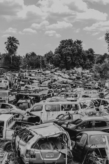 Grayscale Photo Of Broken Vehicles Grayscale Photo Of Broken Vehicles