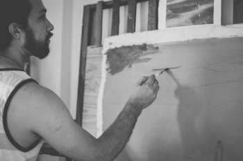 Grayscale Photo of Man Painting Grayscale Photo of Man Painting