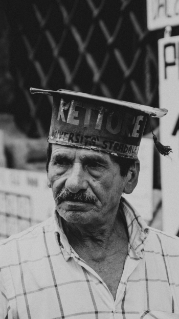 Grayscale Photo of Man Wearing Cap Grayscale Photo of Man Wearing Cap