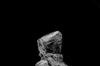grayscale photo of man wearing hooded jacket grayscale photo of man wearing hooded jacket
