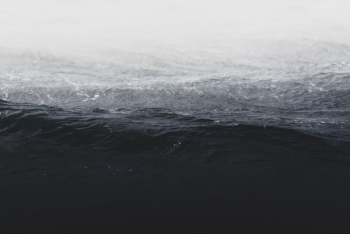 grayscale photo of ocean wave grayscale photo of ocean wave