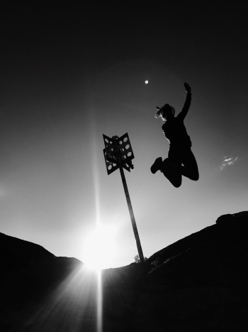 Grayscale Photo Of Person Jumping Grayscale Photo Of Person Jumping
