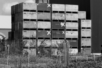 Grayscale Photo of Piled Intermodal Containers Grayscale Photo of Piled Intermodal Containers