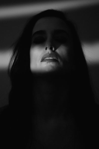 grayscale photo of woman's face grayscale photo of woman's face