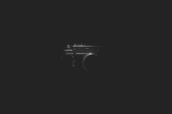 grayscale photograph of DSLR camera grayscale photograph of DSLR camera