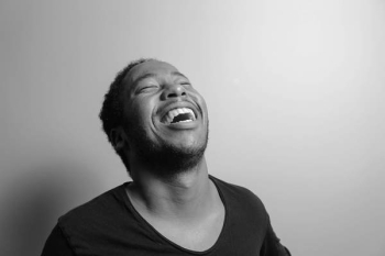 Grayscale Photograph of Man Laughing Grayscale Photograph of Man Laughing