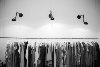 Grayscale Photography of Assorted Shirts Hanged on Clothes Rack Grayscale Photography of Assorted Shirts Hanged on Clothes Rack