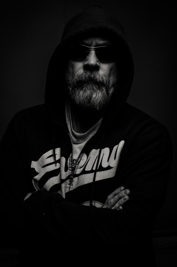 Grayscale Photography of Man Wearing Hooded Jacket Grayscale Photography of Man Wearing Hooded Jacket