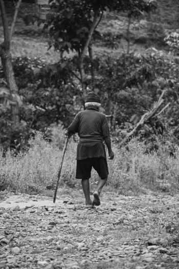 Grayscale Photography of Person Holding Stick Grayscale Photography of Person Holding Stick
